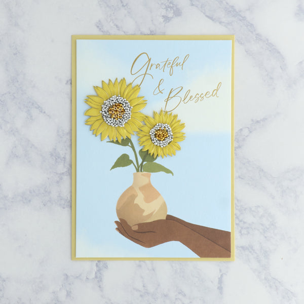 Hand Holding Flowers Mother's Day Card