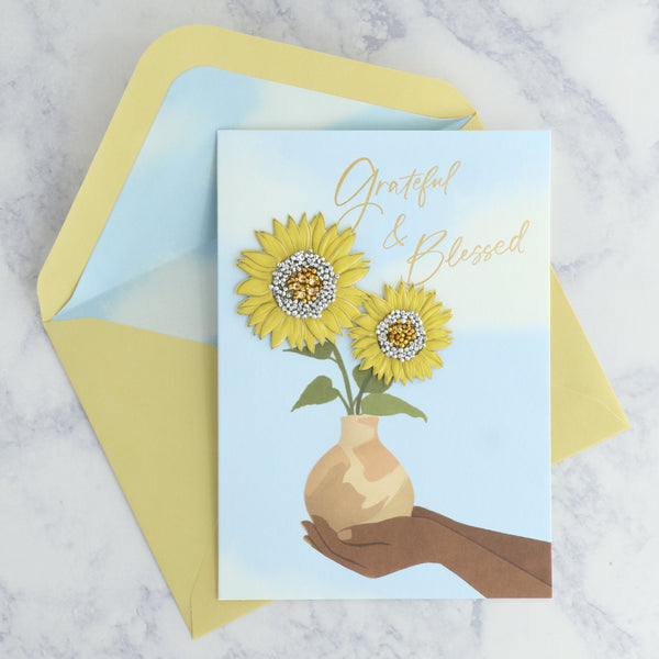 Hand Holding Flowers Mother's Day Card